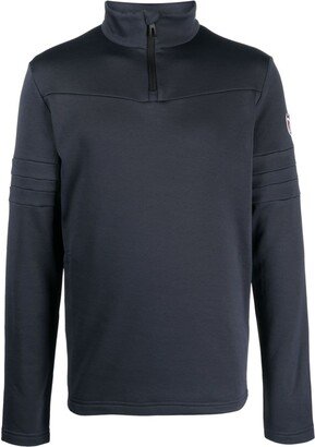 Resort half-zip performance top