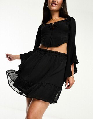 tiered mini skirt in black