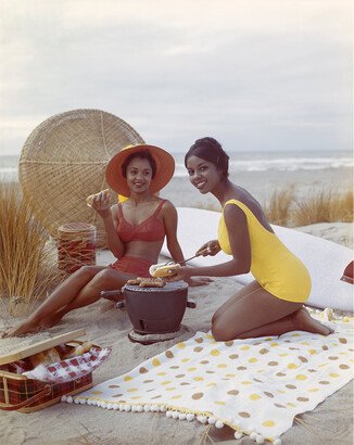 Young Women on the Beach from Getty Images