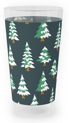 Outdoor Pint Glasses: Winter Village Trees With Snow - Dark Outdoor Pint Glass, Green