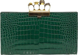 Four-Ring Embossed Clutch Bag