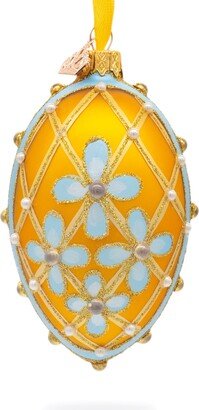 Blue Flowers On Gold Glass Egg Ornament 4 Inches