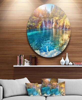 Designart 'Turquoise Water And Sunny Beams' Landscape Photography Circle Metal Wall Art - 23 x 23