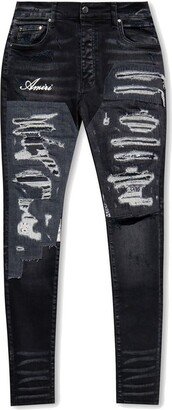 Distressed Tapered Jeans