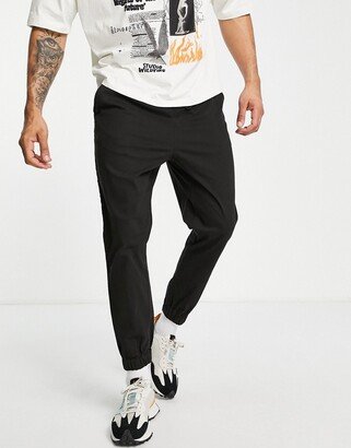 tapered chino joggers with elasticized waist in black