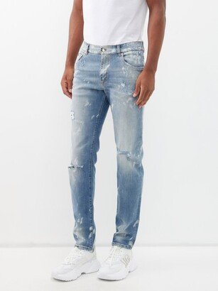 Distressed Light-wash Slim-leg Jeans