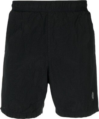 Compass-patch elasticated-waist swim shorts