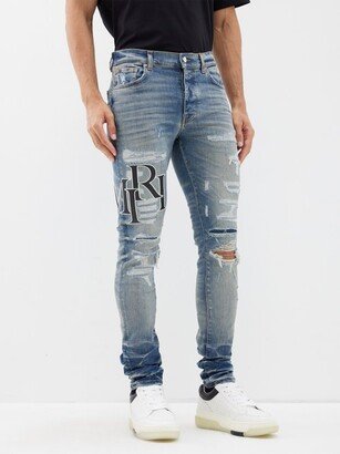 Staggered-logo Distressed Jeans