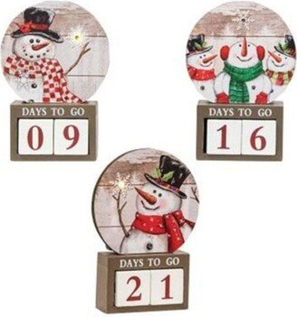 Snowman Countdown with LED Light 3 Asstd. - 7.15” high by 5” wide by 1.5” deep.