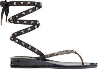 Rockstud flat lace-up thong sandals