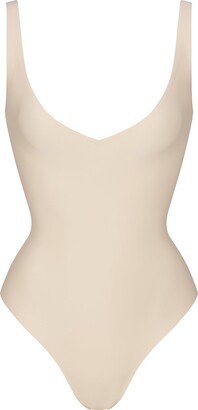 Skims Body Unlined Plunge Thong Bodysuit | Sand