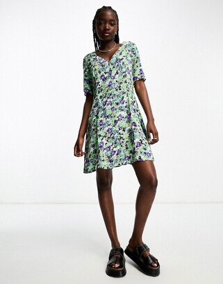 button through mini dress in green floral