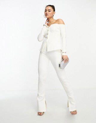 skinny stretch pants with split hem in cream - part of a set