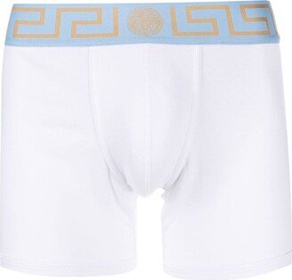 stretch-cotton Greca-pattern swim shorts