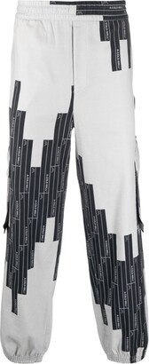 Vector-monogram tapered trousers