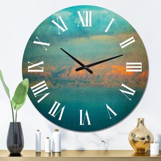 Designart 'Glowing Mountains Over Sea Textured Vintage Image' Modern wall clock