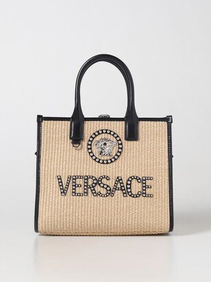 La Medusa bag in raffia and leather with studs