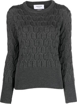 Crisscross cable-knit jumper