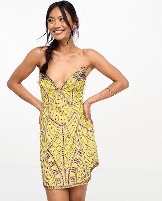 embellished structured plunge mini dress with curve hem in yellow