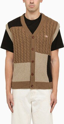 Asymmetrical beige/black knitted waistcoat