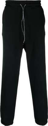 Orb-embroidered tapered track pants