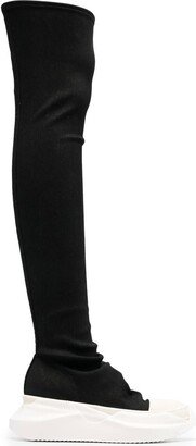 Abstract thigh-high boots