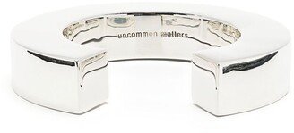 Aperture open-cuff bangle