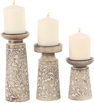 GINGER BIRCH STUDIO Brown Mango Wood Handmade Floral Carved Pillar Candle Holder - Set of 3