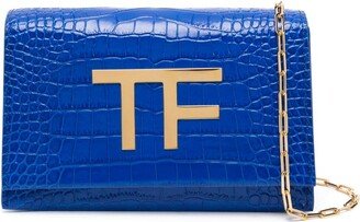 TF-embellished crocodile-effect clutch