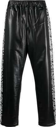 Keith Haring tape-detailing track pants