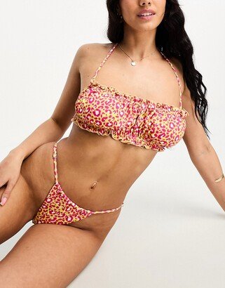 adjustable side tanga bikini bottoms in pink leopard print