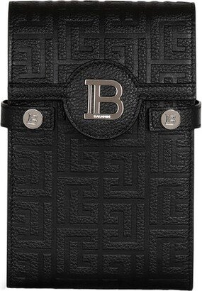 B-Buzz smartphone clutch bag in monogram canvas and leather