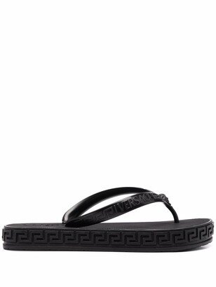 Greca-motif flip flops