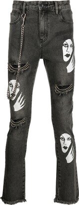 Witch print distressed jeans