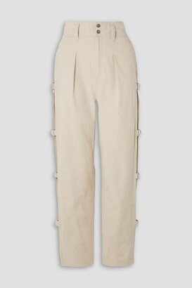 Ring-embellished pleated cotton-canvas tapered pants