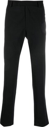 Fly slim-cut tapered trousers
