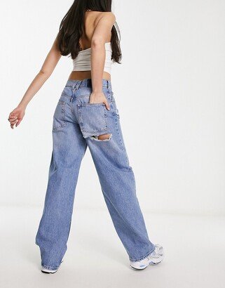 baggy boyfriend jean in mid blue with cheeky rips