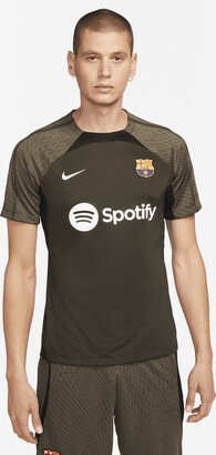 FC Barcelona Strike Men's Dri-FIT Knit Soccer Top in Green