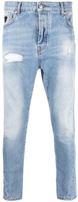 Slim-Cut Distressed Jeans