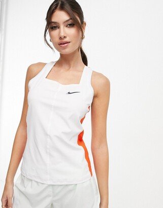 Nike Training Nike Tennis Dri-FIT Slam tank in white and red