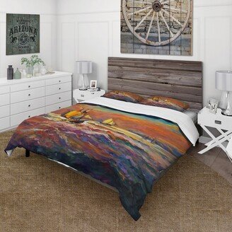 Designart 'Sailships On The Ocean Waves During Orange Sunset' Nautical & Coastal Duvet Cover Set