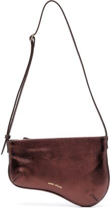 Curved metallic shoulder bag