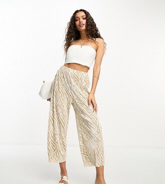 ASOS DESIGN Petite plisse wide leg pants culottes in khaki animal