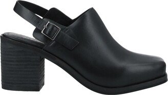 INTENTIONALLY _______. Mules & Clogs Black