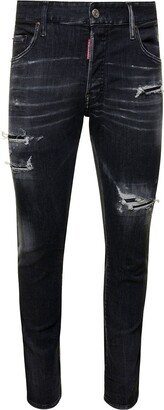 'Skater' Black Five-Pocket Jeans with Rips and Bleach Effect in Stretch Cotton Denim Man