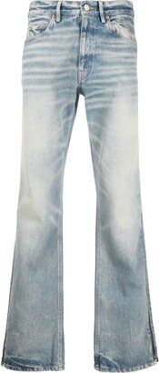 Distressed-Finish Denim Jeans