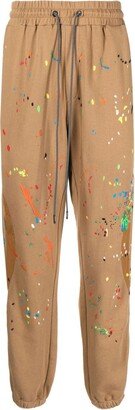 Warped paint-embroidered track pants