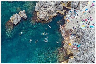 Gray Malin Lido del Faro swimmers, Capri