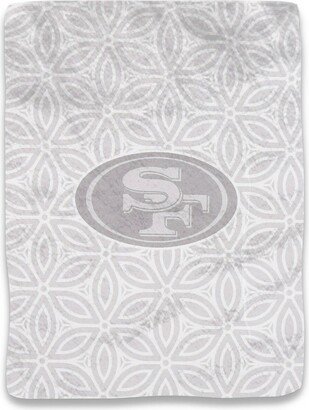 The San Francisco 49ers 50'' x 60'' Floral Raschel Throw Blanket